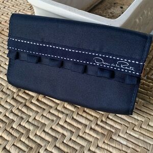 Oscar de la Renta Blue Clutch with pink interior lining and ribbon detailing